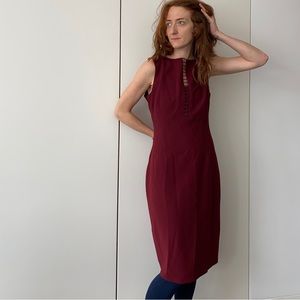 Elie Tahari maroon dress. Polyester, real lamb leather, silk, and elastane.